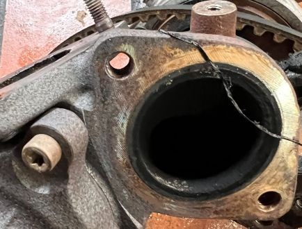 Close-up of engine housing opening during engine inspection